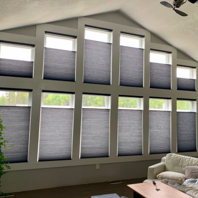 Saint Paul AB shades installation in bright home living room