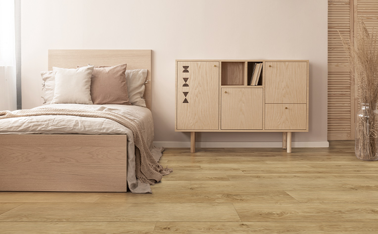 canadian luxury vinyl in bedroom with tan book shelf